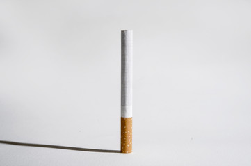 cigarette and shadow isolated on white background in unhealthy h