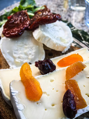 italian starters - blue cheese, dried tomatoes, dried fruits, camembert, 