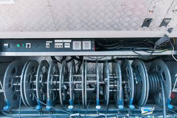Focus so desiredSteel roller with fiber optic cables for the installation of data cables on a...