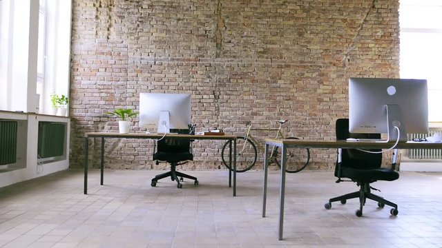 The interior of big bright empty modern office after work.