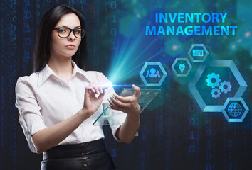 The concept of business, technology, the Internet and the network. A young entrepreneur working on a virtual screen of the future and sees the inscription: Inventory management