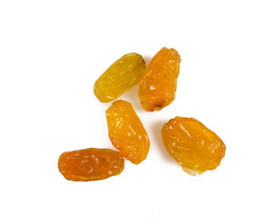 yellow raisins isolated on whtie