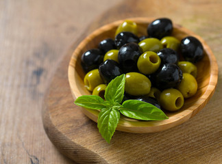 olives in a wooden bowl