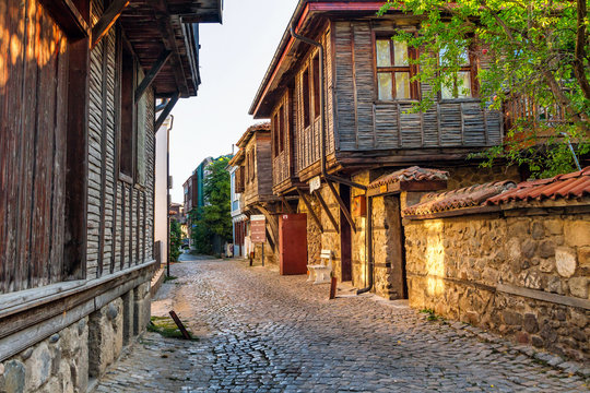 Fototapeta City landscape - old streets and homes in balkan style, town of Sozopol on the Black Sea coast in Bulgaria, September 14, 2017