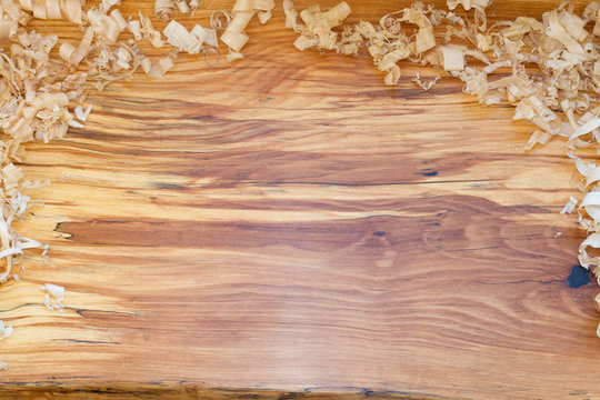 Live Edge Wood Slab With Wood Shavings