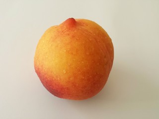 Peach on white background