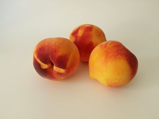 Peaches on white background

