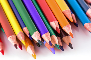 Color pencils on white background. Different colored pencils