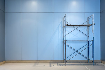 Large empty storehouse with scaffold. space for text or product