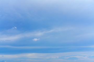 Beautiful white clouds and blue sky background