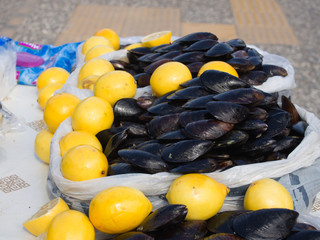 stuffed mussels and lemons on the street