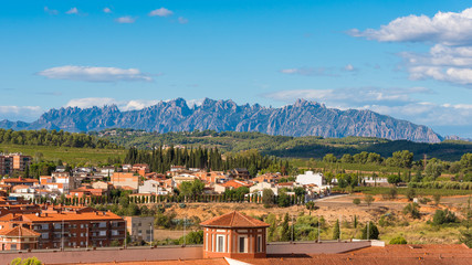 View of the building in the valley of the mountains of Montserrat, Barcelona, Catalonia, Spain. Copy space for text.