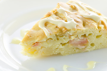 A serving of Apple pie on a plate