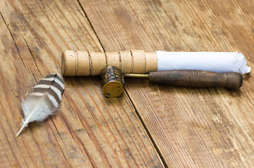 Traditional antique tool in casting metal products from lead dispenser ladle with patina on a wooden background