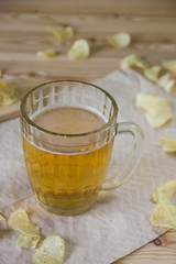 Beer and chips on the table. Octoberfest theme