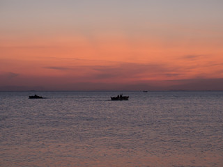 Fototapeta premium small boats at sunset