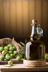 Olive Oil And Olive Sprig With Green Olives