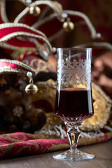 Red wine and Venetian carnival masks.