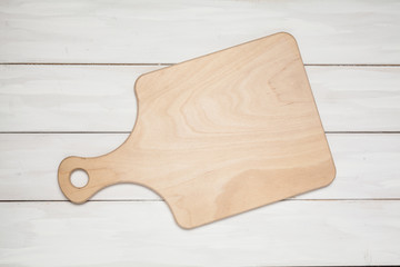 Wooden cutting board. A kitchen accessory. Preparation. For your design.
