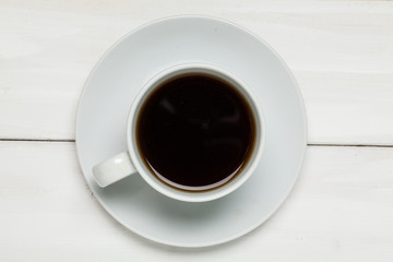 A cup of black coffee. Hot invigorating drink. In the morning. For your design.