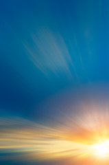 Sunset among cirrus clouds in the sky.