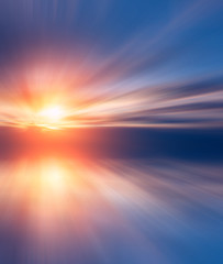 Abstract unreal violet-purple sunset in the heavens above the sea.
