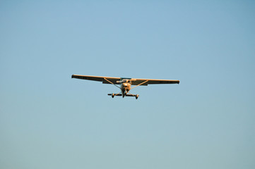 single engine passenger plane approaching for landing