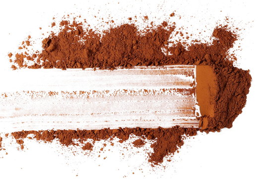 pile cocoa powder isolated on white background, top view