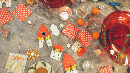Gingerbread house making by hands. Christmas holiday.