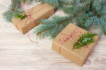 Fototapeta na wymiar Classy Christmas gifts box presents on brown paper