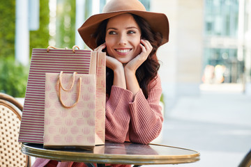 happy woman with shopping bags - 176418214