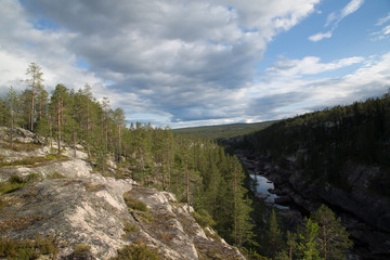 Fototapeta na wymiar Rock canyon near by Porjus, Sweden, summer
