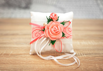 Wedding accessories. Elegant pillow or cushion for rings. Wedding ceremony.