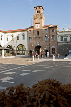The clock tower or "Torresin" in Piazza Grande in Oderzo. Ancient city of Roman origin in the province of Treviso, Italy.