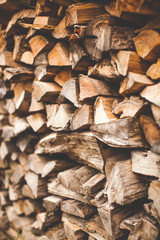 Beautiful Photo background of Heap firewood stack, natural wood for publication in magazine or advertisement
