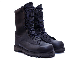 Pair of black military style leather boots, isolated