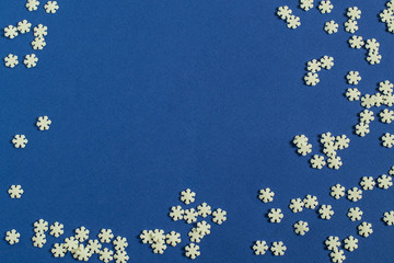 Christmas background with sugar decoration in form of snowflakes