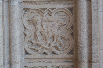 Carving of religious scene in stone of a church