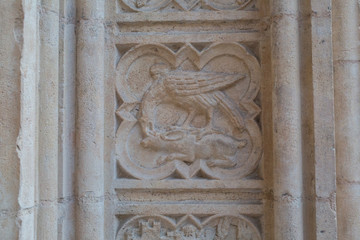 Carving of religious scene in stone of a church