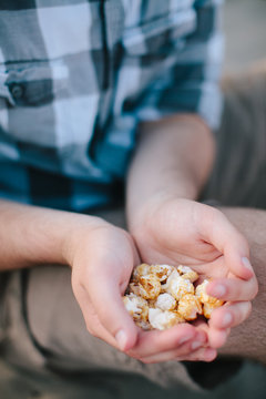 Man holds kettle corn