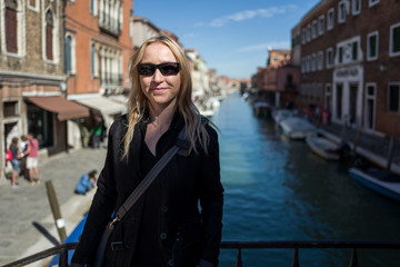 Fototapeta na wymiar blonde girl in Murano