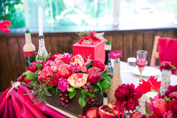 wedding tabble with red coloured cloth