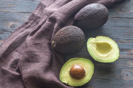 Hass Avocados On The Wooden Background