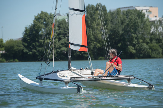 man sailing for relaxation