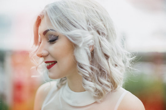 Profile picture of young urban fashion woman with stylish light grey hair