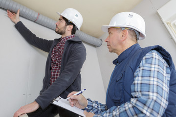contractor manager inspecting the works done