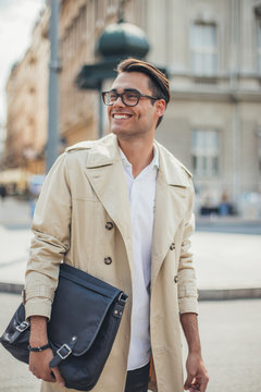 Young Business Man Walking in the Street.