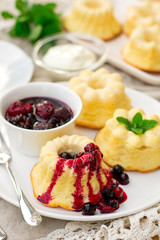 Baked sweet ricotta pudding cheesecake with sour cream and berries