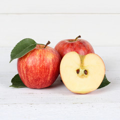 Äpfel Apfel rot geschnitten Obst Frucht Quadrat Früchte auf Holzplatte