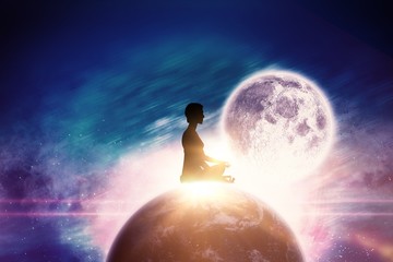 Composite image of side view of person practicing meditation 